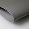 Tissu enduit de silicone renforcé de fibre de verre de côté simple d'acier inoxydable pour des rideaux en retenue du feu